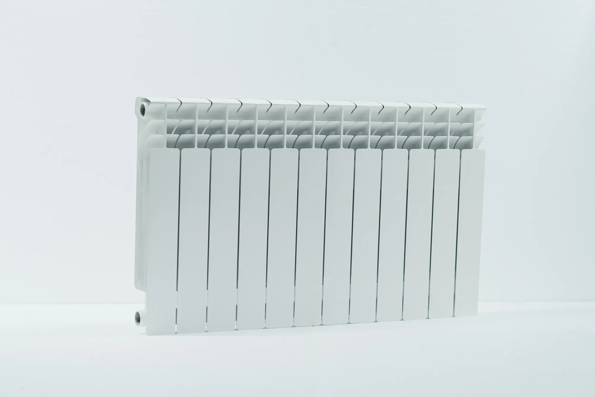 Радиатор алюминиевый секционный 500/100/12 боковое подключение Русский радиатор RRC500*100AL12