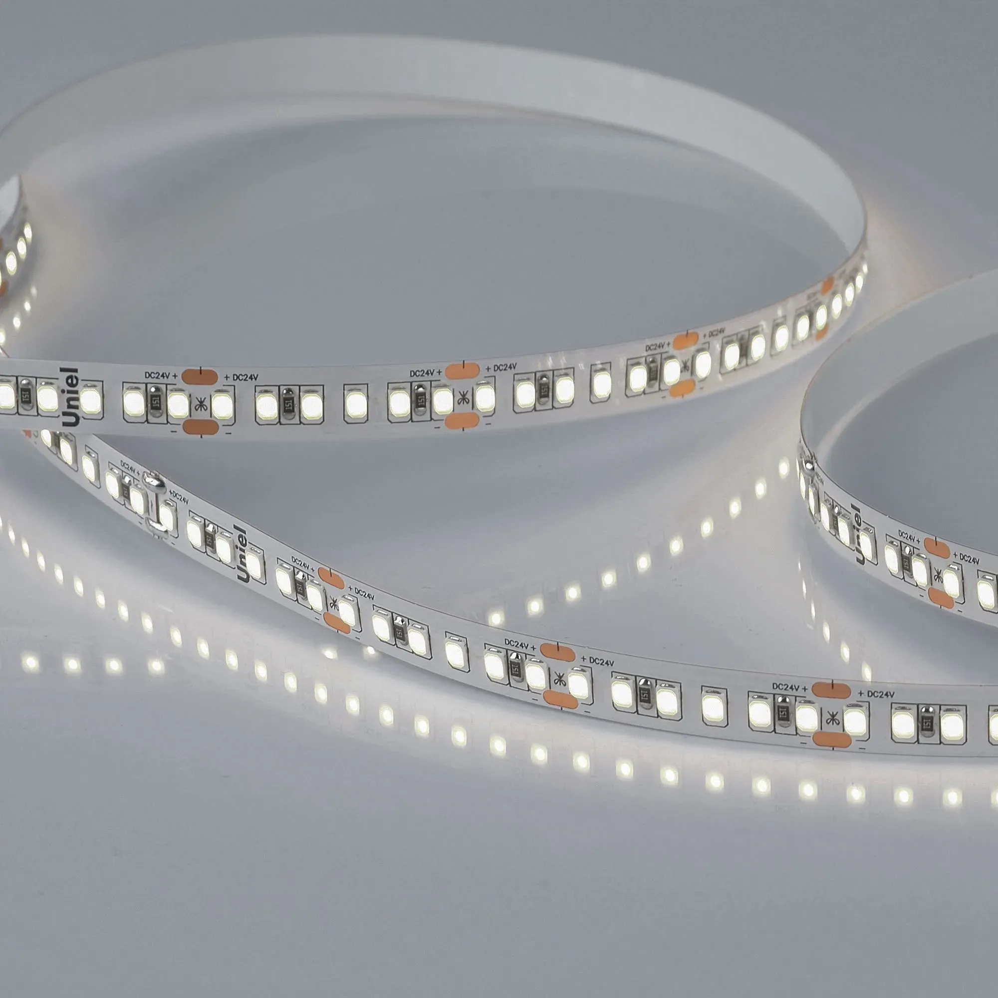 Лента гибкая светодиодная на самоклеящейся основе. ULS-2835-168LED/m-10мм-IP20-DC24V-14W/m-5м-4000K, катушка 5 м. в герметичной упаковке. (4000K).