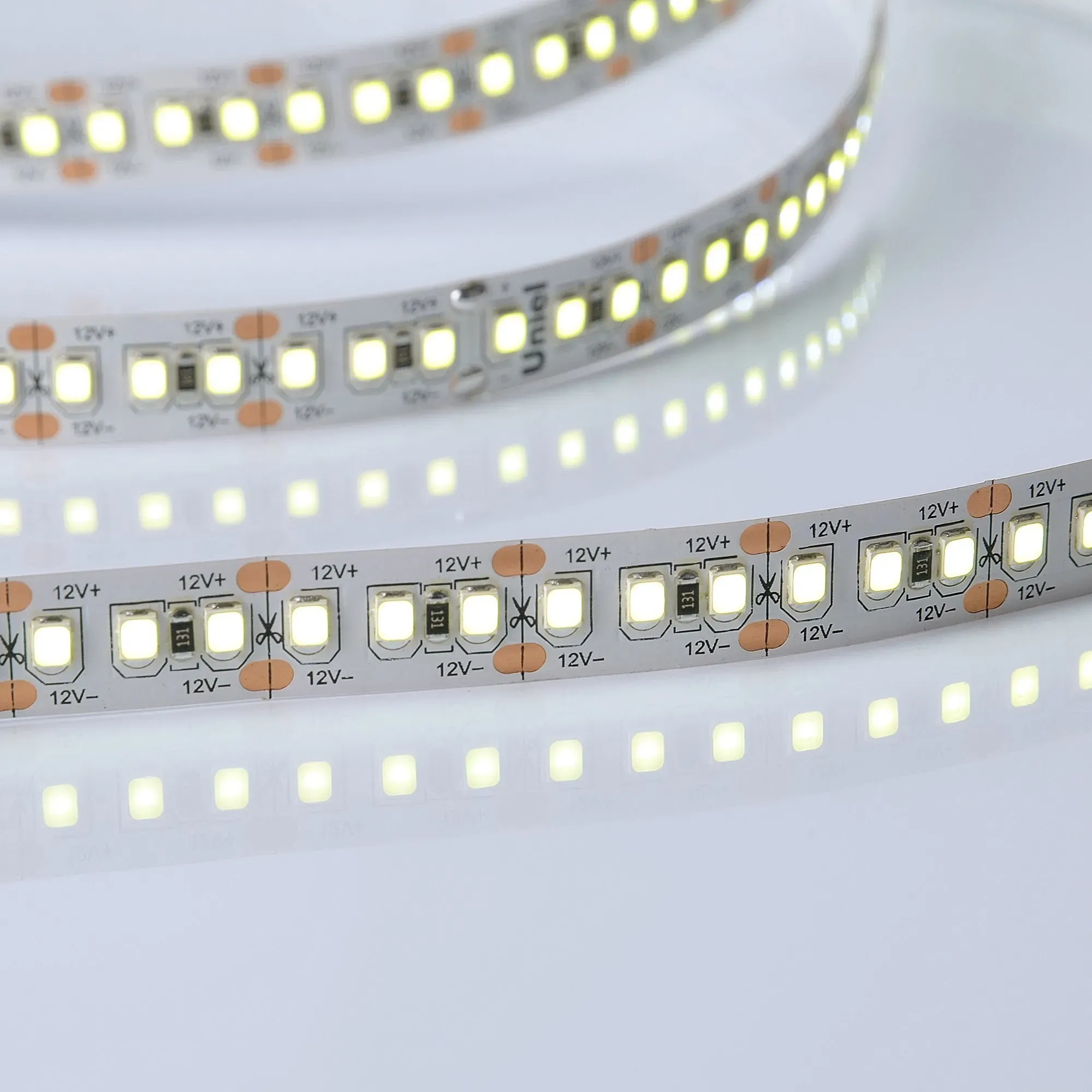 Лента гибкая светодиодная на самоклеящейся основе. ULS-M16-2835-180LED/m-10мм-IP20-DC12V-17W/m-5м-6500K PROFI Катушка 5м. в герметичной упаковке. Дневной свет (6500K) Uniel ul-00007641